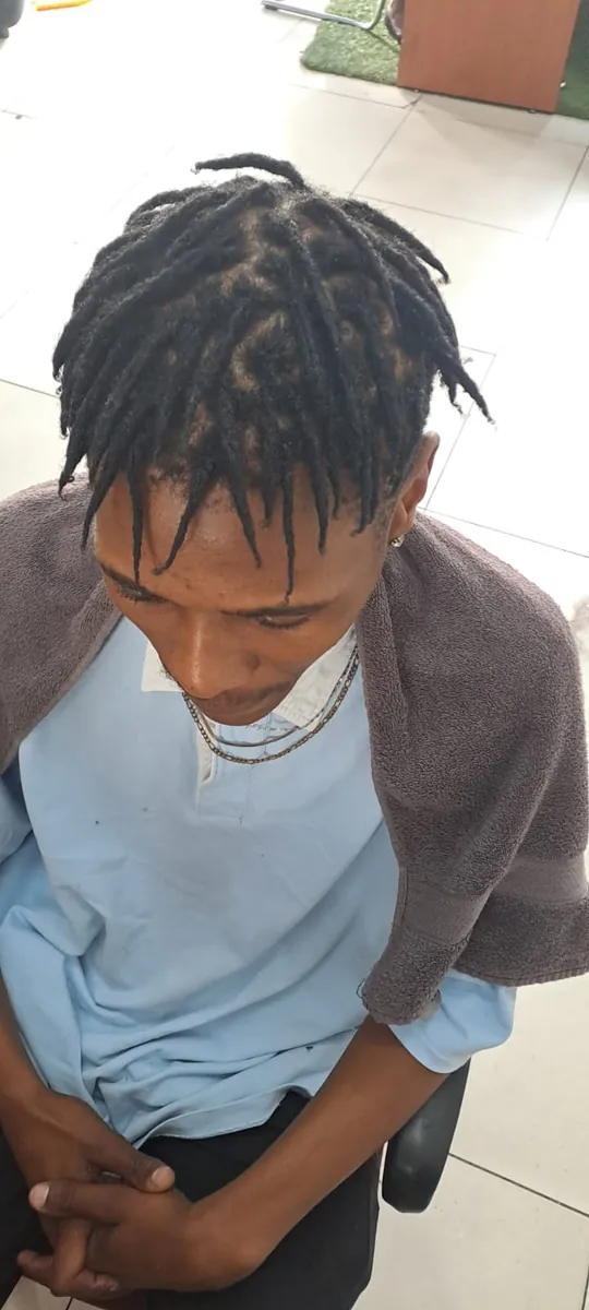 Fresh locs seen from above, neat scalp partings