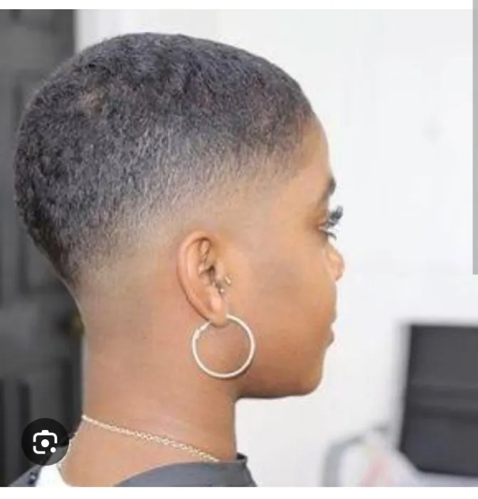 Woman with a short tapered natural cut